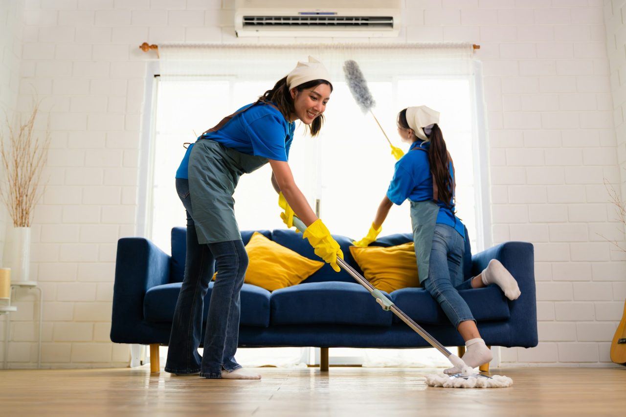 couple of housekeeping staff cleaning house housekeeping and cleaning service people doing 1